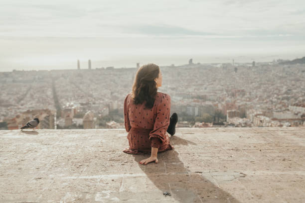 istock Woman looking at Barcelona 1441883164