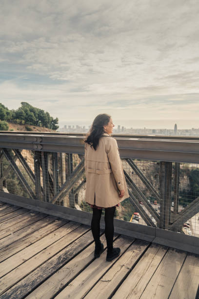 istock Woman looking at Barcelona 1441883514
