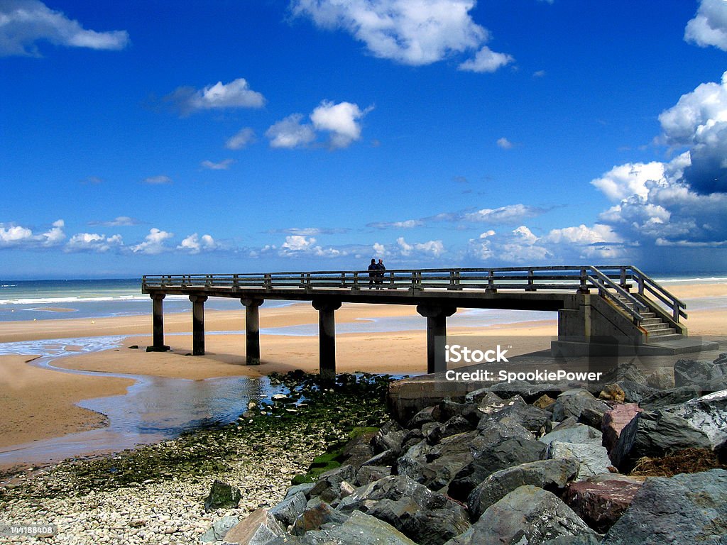 Bridge at Omaha beach A picture of a bridge on Omaha beach, Normandy, France. Beach Stock Photo