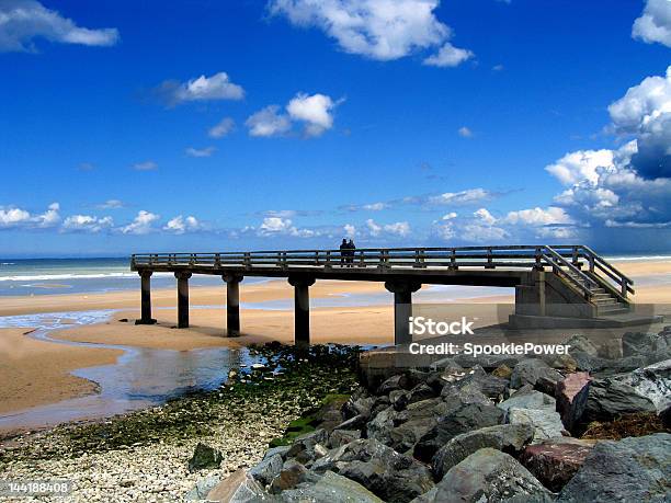 Bridge At Omaha Beach Stock Photo - Download Image Now - Beach, Blue, Boulder - Rock