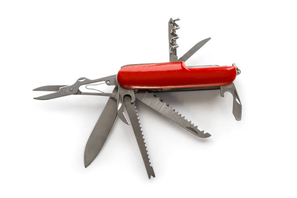 Swiss army knife on a white background Swiss army knife on a white background penknife stock pictures, royalty-free photos & images