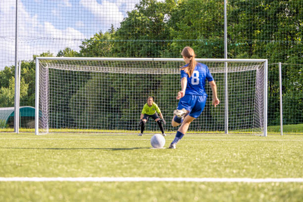 istock Balll kicked towards a goal 1441885989