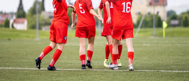 istock Red women's soccer team 1441885997