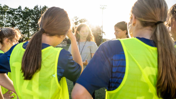 istock Women's soccer team are taking instruction from team coach 1441886061
