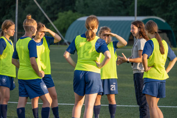 istock Women's soccer team are taking instruction from handicapped team coach 1441886082