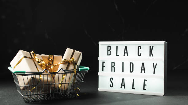 istock Black Friday present into a shopping cart 1441886354