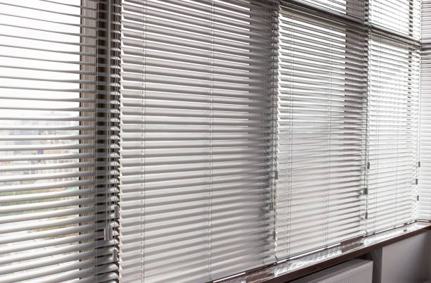 istock Venetian blinds closeup on the window. 1441888863