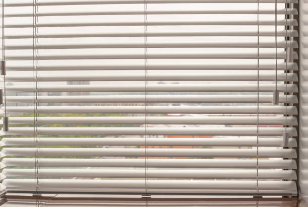 istock Venetian blinds closeup on the window. 1441888870