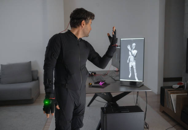 istock A Caucasian guy is creating a 3d animation by using a mock-up smart suit. 1441893098