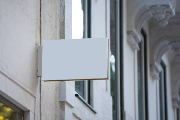 istock A white horizontal sign board mock up hangs on the wall 1441897442