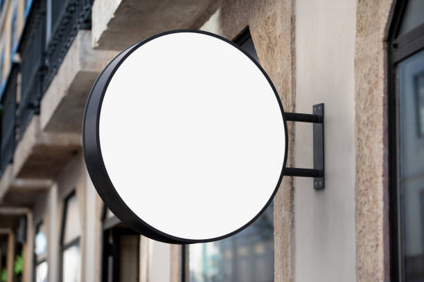 istock Mockup of a signboard hanging on a building 1441897457