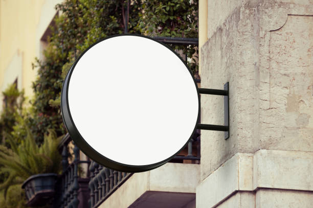 istock Round wall sign board mockup for cafe logo 1441897467