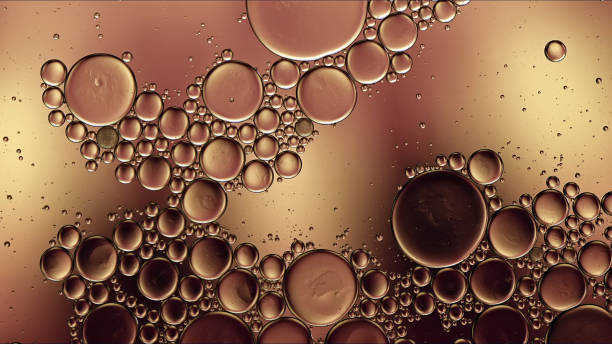 istock Abstract Colorful Food Oil Drops Bubbles and spheres Flowing on Water Surface 1441897607