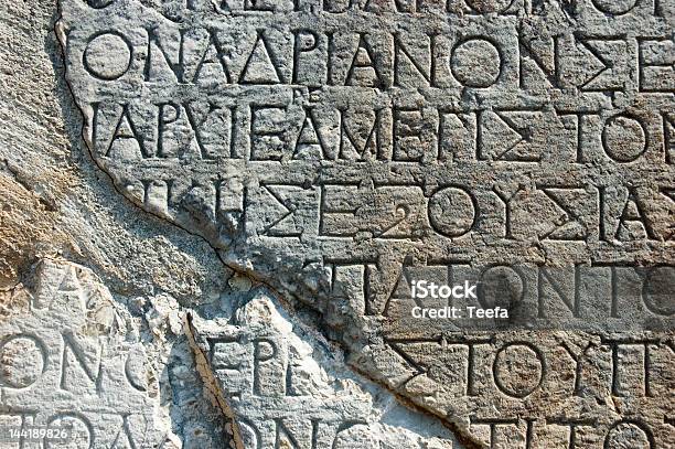 Greek Text Inscription On A Rock In Delphi Stock Photo - Download Image Now - Text, Classical Greek, Ancient Greece