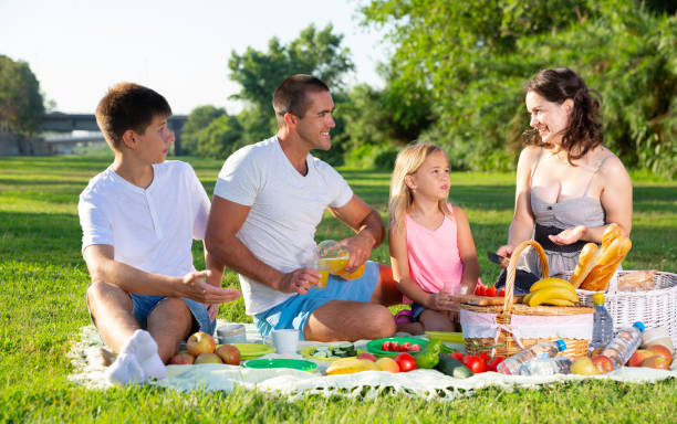 istock Friendly family at picnic 1441904228