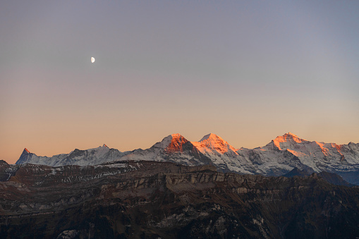 Scenic view of snow-covered Swiss Alps  in winter at twilight