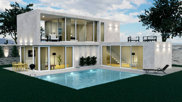 istock 3D rendering of a beautiful modern house with swimming pool and night light 1441909459