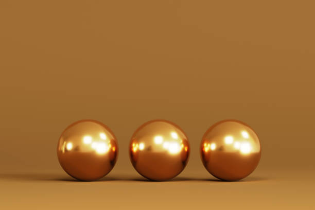 istock Three gold Christmas tree bauble isolated on a dark background. 3d render 1441909528