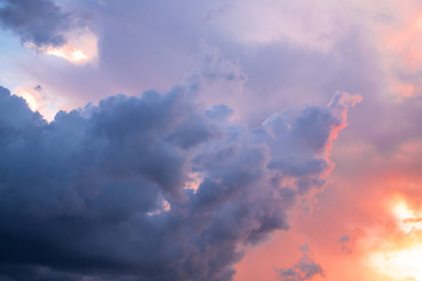 istock beautiful gradient orange clouds and sunlight on the blue sky perfect for the background, take in everning,Twilight 1441909809