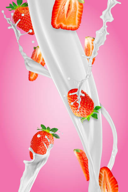 istock Fresh strawberries falling to make a delicious strawberry smoothie. pink background. 1441914296