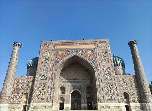 Madrasah Sher-Dor courtyard. Detail of the facade