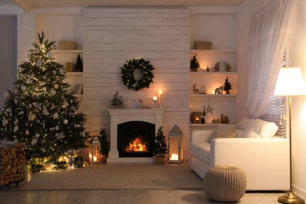 istock Stylish living room interior with decorated Christmas tree and comfortable sofa 1441922574
