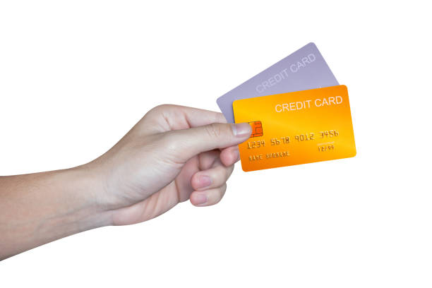 istock Hand showing credit card isolated on grey background. 1441923763