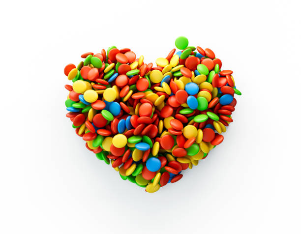 istock Colorful button candies heart shape on White background. Top view 3d illustration 1441923926