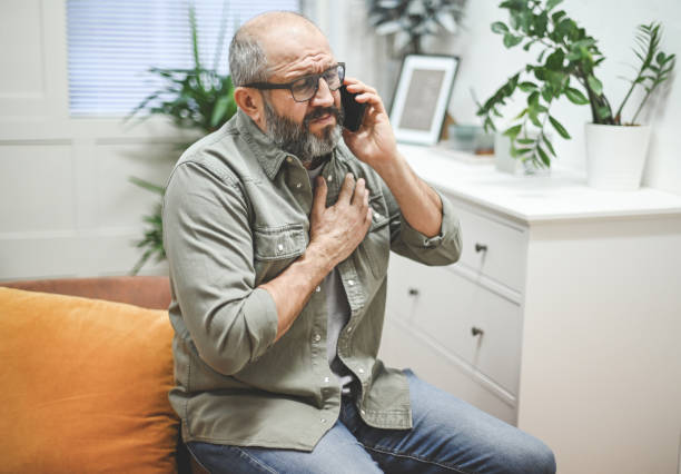 istock Mature adult man illness (mobile phone) 1441924344