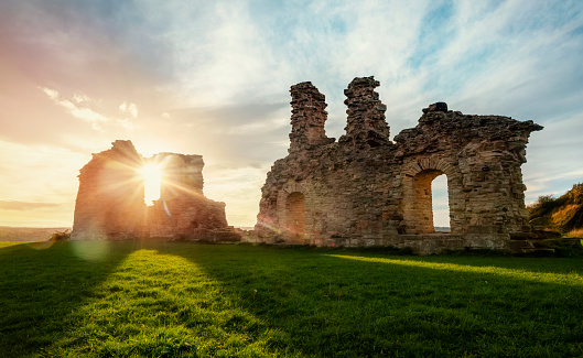 unknown ordinary ruins in yorkshire in countryside at sunset