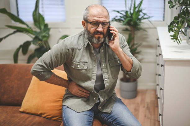 istock Mature adult man illness (mobile phone) 1441924906