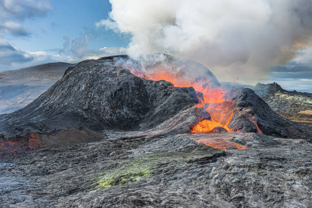 istock Volcanic eruption in Iceland at day with smoke 1441929415