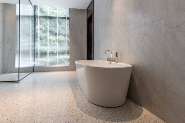 istock Bathtub in spacious and bright bathroom 1441930841