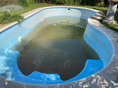Domestic home Swimming pool in need of cleaning and maintenance