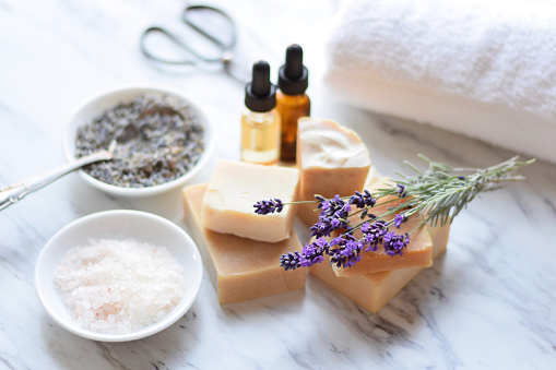 Handmade soap bars, essential oils, bath salts, dried and fresh lavender flowers