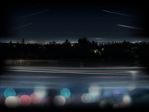 3D background illustration with visible light streaks and bokeh effects, cityscape at the horizon and some trees silhouettes. Airplane trails and stars in the sky. Empty space to put text logos and graphics available.