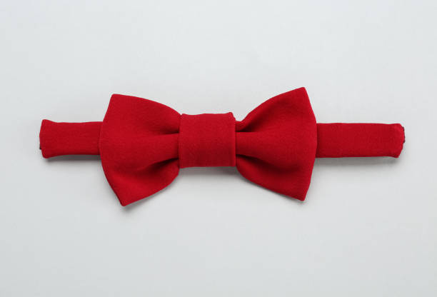 istock Stylish red bow tie on white background, top view 1441946045