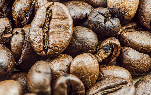 Close up of coffee beans background. Selective focus.