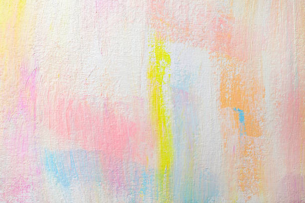 istock Strokes of different pastel acrylic paints on white canvas, closeup 1441946779