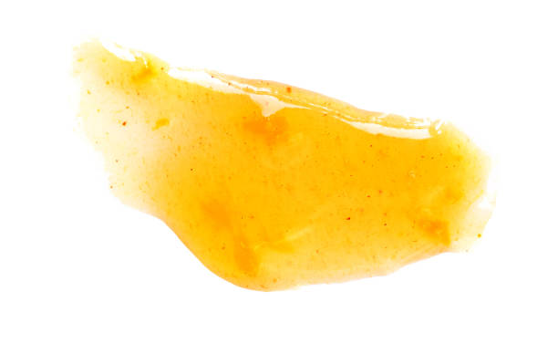 istock Orange fruit  jam isolated on white background, top view. Orange or mandarine spread  Flat lay 1441948561