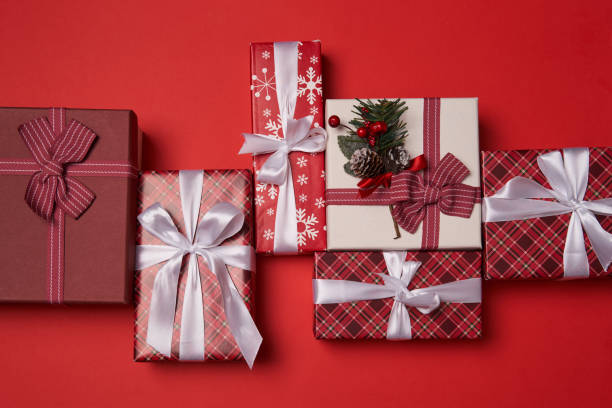 istock Group of gift boxes on red background. 1441950517