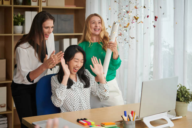 istock Businesswomen Celebrating Success 1441950788