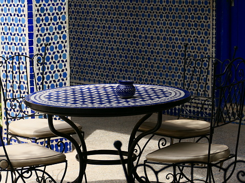 The table and the ashtray, inner courtyard of the Laazama Synagogue, Marrakech, Morocco