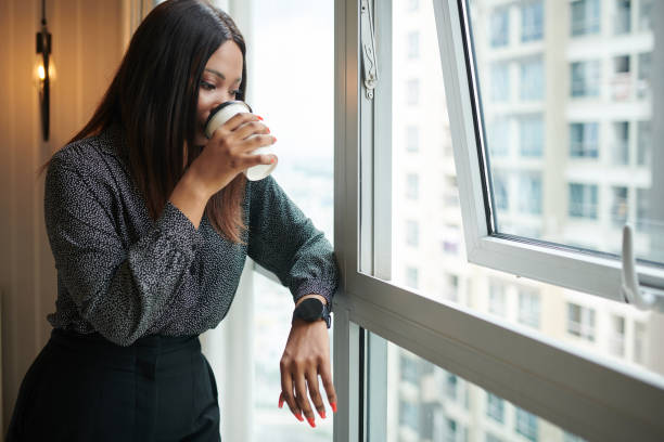 istock Female Entrepreneur Looking through Window 1441955166