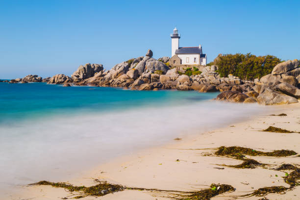 istock Pontusval lighthouse from coast in Kerlouan 1441970824
