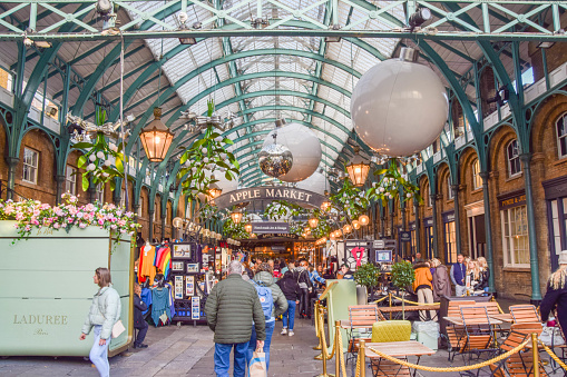 London, UK. November 4 2022: Christmas decorations at a busy Covent Garden Market