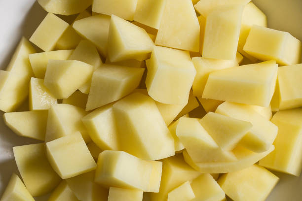 istock A bowl is filled with chopped raw potatoes. 1441973654