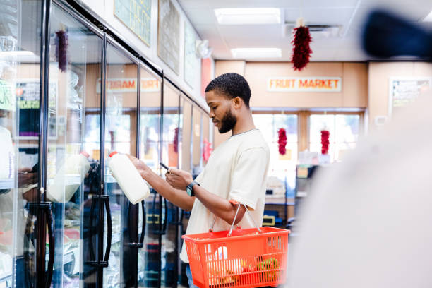 Young adult male reads a message