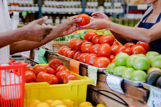 istock Unrecognizeable people at the grocery store 1441978145