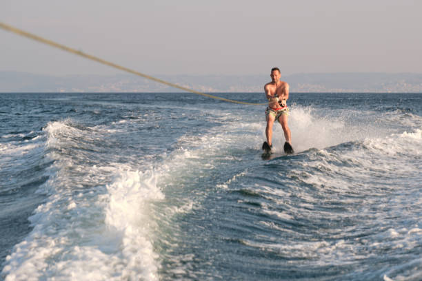istock Man waterskiing on sea at summer 1441981416